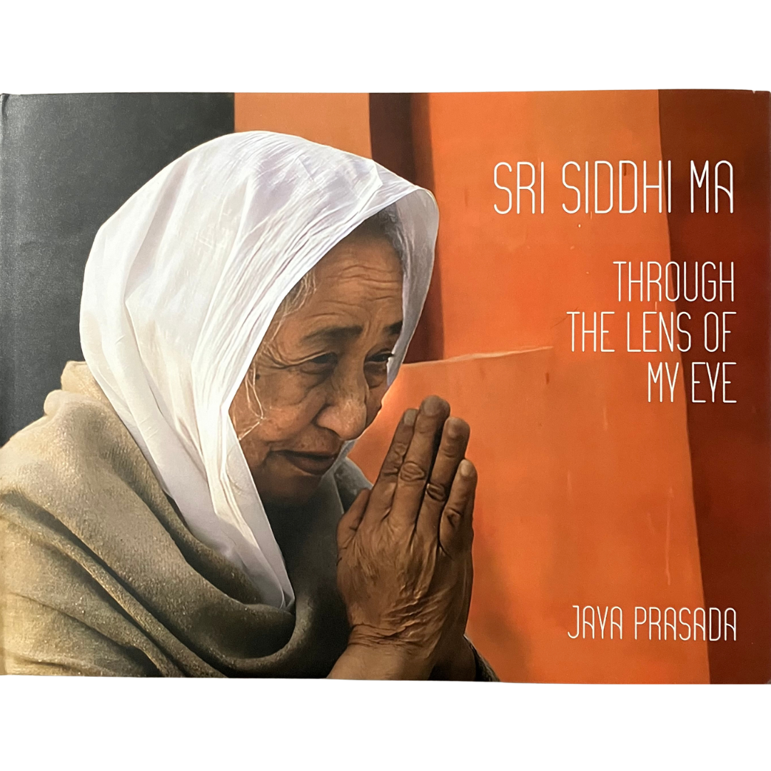 Book cover featuring an elderly woman with hands clasped, titled 'Sri Siddhi Ma Through The Lens Of My Eye' by Jaya Prasada.