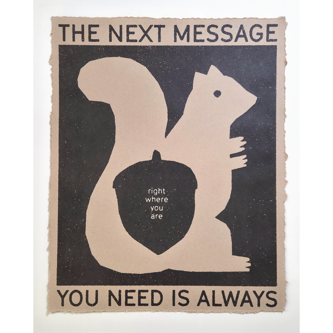 Right Where You Are poster print showing a beige squirrel holding an acorn on a black background, with text reading "The next message you need is always right where you are"