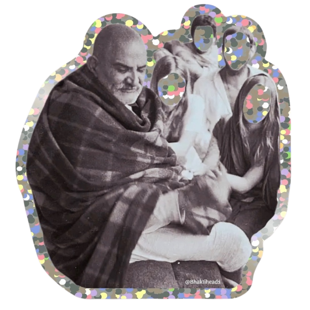 A die-cut sticker or decal featuring a black-and-white photo of an elderly man wrapped in a plaid blanket, with three blurred faces in the background, surrounded by a glittery multicolor border on a white background.